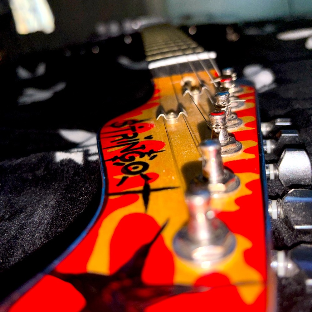 Vibrant Red and Yellow Electric Guitar